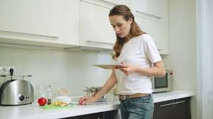 Put your apron on, grab a rolling pin and sing along as we stir A Man In The Kitchen Stock Footage Video 100 Royalty Free 1035351362 Shutterstock
