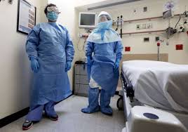Hospital Works Ppe Gear Ppe Stands For Personal Protective Equipment Mandated By Osha Occupational Health Hazardous Material Suits Ebola Outbreak Ebola
