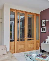 Rustic alder solid lumber eyebrow arch glass double door speakeasy wrought iron. Internal Glass Double Doors London Door Company