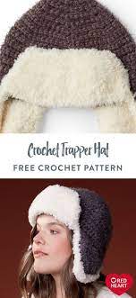 Crochet Trapper Hat Free Crochet Pattern In Red Heart Hygge Yarn Look To This Fur Trimmed Crochet Hat To Keep You T In 2021 Crochet Crochet Hats Messy Bun Hat Pattern