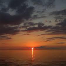 With colorful red, orange and purple clouds reflected in the ocean water and columns of an old. Sea Sky Clouds Nature Sunset 4k Ipad Pro Wallpapers Free Download