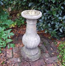 A birdbath will welcome feathered friends into your garden throughout the year. Victorian Brass Stone Sun Dial Garden Sundial