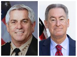 Sheriff Nanos and his rival share similar goals,