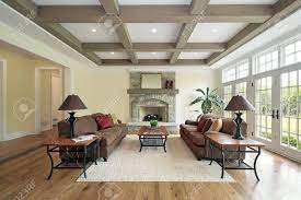 Exposed ceiling beams can immediately add warmth and charm to any dull room. Family Room In New Construction Home With Wood Ceiling Beams Stock Photo Picture And Royalty Free Image Image 6739096