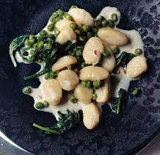 Lemon Gnocchi With Spinach And Peas By Epicurious Easy And Delicious The Zing Of Fresh Lemon Enhances Both The Peas Sweetness And T Recipes Food Pea Recipes