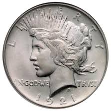 From your description the coin is a 1921 morgan dollar and it's the most common of all morgan dollars. United States 1921 Peace Dollar