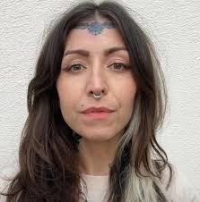 🚨BREAKING: This lady has been arrested and charged with threatening to  kill federal agents during an immigration arrest outside a courthouse.  Prosecutors say Bethany Abigail Terrill shouted, “Charlie Kirk died and we