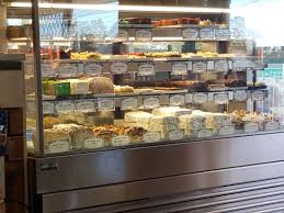 This furniture piece is a series of wooden cabinets, with the lower section holding a large model of a hunter in a glass case. Well Stocked Display Cabinet Picture Of Le Vintage Boutique Cafe Worongary Tripadvisor