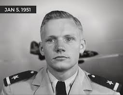 Nev Dawson kneeling behind his Dynajet powered Grumman Panther at what I  think was the first Fielding nats in 1961.