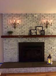 Final Product White Wash Brick Chalk Painted Sconces And Spray Painted Fireplace For Uniform Look Family Room Paint White Wash Brick Fireplace