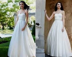 In addition to its royal tribute, the design featured a mix of 1950s bridal style and modernity that helped emulate kate middleton's wish to keep within tradition yet add some modern flair. Kate Middleton Inspired Wedding Dress Davids Bridal Newclotheshop