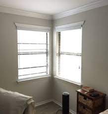 And it made sense too; Transforming A Room With Corner Curtains And A Corner Curtain Rod Hack