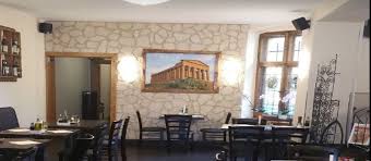 Two nearby tables were being set for a party of 16 and party of 8. Sapori Di Casa