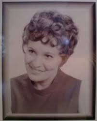 Can you identify others in the photo with bangs and glasses?