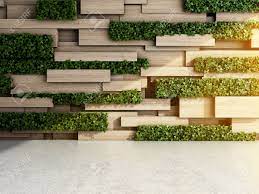 Part of the success of this design is in the use of subtle shades of color from the leaves themselves. Wall In Modern Interior With Wooden Blocks And Vertical Garden Stock Photo Picture And Royalty Free Image Image 69798478