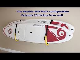 A Metal Sup Wall Rack With Suspension Straps That Holds 1 Sup In 2020 Wall Racks Garage Racking Rack