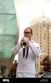 DETROIT, Mich. (Aug. 24, 2015) Musician 3rd Class Steven Del Ross, assigned  to Navy Band Great Lakes, warms up before a concert at an event marking the  official kickoff of Detroit Navy