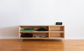 This entire table is made from a single sheet of plywood and was built with only two power tools. Dwell Made Presents Diy Plywood Media Console Quality Living Room Furniture Furniture Media Console