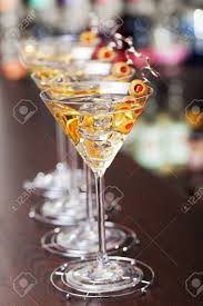 Become a fan remove fan. Several Glasses Of Famous Cocktail Martini Shot At A Bar With Stock Photo Picture And Royalty Free Image Image 38362807