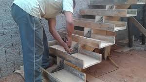 The concrete's ingredients can be just as important as it's shape. Skillful Construction Workers In Action Concrete Formwork Floating Stairs Canvids
