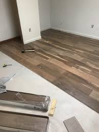 How To Install Laminate Floor On Concrete Laminate Flooring Flooring Installing Laminate Flooring