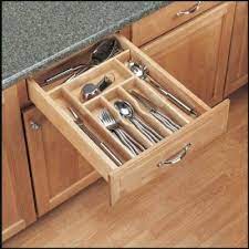 Organizing is simple with products like cutlery trays, pegboard drawer systems and spice racks. Cabinet Accessories Sollera Fine Cabinetry