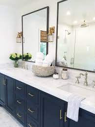 Black pulls and brass accents give modern polish to this bathroom's neutral palette. Top 10 Double Bathroom Vanity Design Ideas Bathroom Vanity Designs Double Sink Bathroom Vanity Design