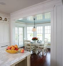 I love the detail of the brass foot rest beneath the seating banquettes, too! How To Arrange An Adorable Breakfast Nook In The Kitchen