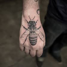 As tattoos, they can be designed alone but are often portrayed with flowers, in a cartoon form, or they may look more realistic. 23 Awesome Realistic Bee Tattoos