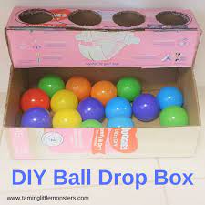 Diy Ball Drop Box For Babies Montessori Toddler Activities Ball Drop Baby Play Activities