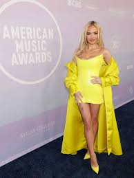 Actress Natalie Alyn Lind stuns on the American Music Awards red carpet and  talks about what inspired her look.