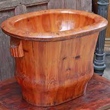 6 1/2 h x 13 l x 8 w at base, england, likely 1800ss. Chinese Elm Wood Baby Bath Midwives Birthing Basket