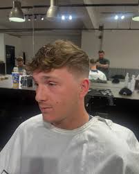 Skinner with textured top, styled using @barbersno1 boost powder.