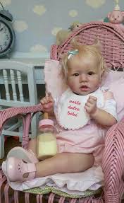 The Text On Her Bib Says Norte Dulce Bebe Which Is Our Sweet Baby In French Baby Doll Nursery Reborn Toddler Dolls Silicone Reborn Babies