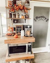 26 Home Coffee Station Ideas To Help You Quit Starbucks Posh Pennies En 2020 Station De Cafe Starbucks Penny
