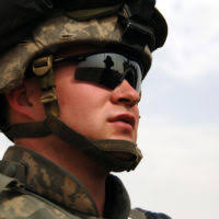 U.S. Army soldiers from the 101st Division stop three civilians in a red  toyota hilux pick up truck in the western Desert of Tikrit, Iraq