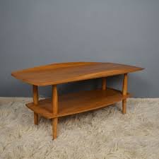 A rich, waxy finish enhances the wood's tonal variation for a look sure to entice. Mid Century Danish Coffee Table With Rounded And Raised Edges Retrosexual Vintage Shop