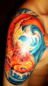 Fantastic Orange Koi Fish Tattoo On Bicep Koi Fish Tattoo Bicep Tattoo Orange Koi