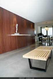 Plywood, involved in the manufacturing of plywood and doors since 1986. Interiors Of A House With Modern Wood Panels Walls Modern Bench Polished Cement Floor Modern Light Fixtures Bedroom Dining Room Decor Modern Polished Concrete