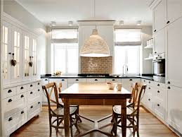 In this kitchen, also designed by jessica helgerson of jessica helgerson interior design, a statement art piece steals the spotlight. Eat In Kitchen Design Transitional Kitchen Loft