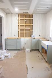 The Burrow Kitchen Cabinet Installation This Diamond Intrigue Line From Lowe S Was The Perfect In 2020 Installing Cabinets White Farmhouse Sink Custom Built Cabinets