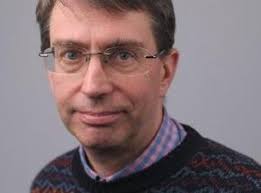 Mencap members receive presents at Christmas party