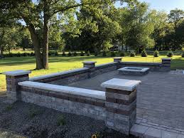 Maybe you would like to learn more about one of these? South Lyon Michigan Unilock Brussels Block Retaining Wall Fire Pit And Pillars With Beacon Hil Outdoor Patio Ideas Backyards Paver Patio Backyard Seating Area