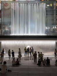Fountains Jet Water Over Entrance To Foster Partners Sunken Apple Store In Milan Foster Partners Apple Store Design Architecture