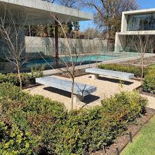 Benches And Garden Designed By The Very Talented Virginia Kennett Benches Look Awesome In This Seating Area Zagar Landscape Design Garden Design Seating Area