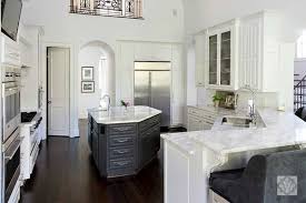 Tips For Transforming Your Kitchen Without Gutting It Dana Wolter Interiors Kitchen Peninsula Kitchen Redesign Curved Kitchen