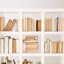 Though the shelves are secured to the walls on their own, the string gives the appearance that each. Shelf Effacement How Not To Organise Your Bookshelves Books The Guardian