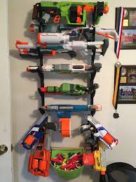 Keeping nerf guns and ammo on racks or in storage containers is a great way to organize your nerf guns and avoid losing your darts. Pin On Create It