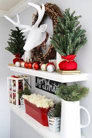 How To Style Floating Shelves For The Holidays Christmas Bookshelf Christmas Decorations Natural Holiday Decor
