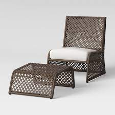 And you'll never have to worry about the wicker rotting: 2pc Byler Woven Patio Chair Ottoman Set Project 62 Target